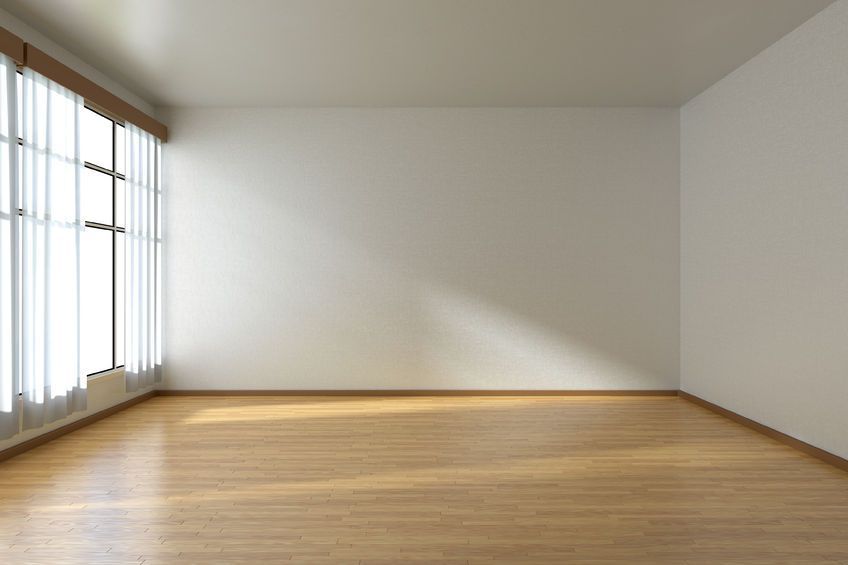 Empty kitchen and dining space before virtual staging